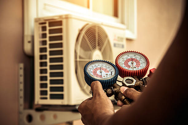 Professional Hvac technician working in Lester, AL